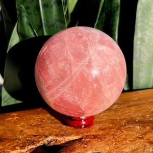 Rose Quartz Sphere w/ stand - lots of rainbows - crystal for drawing in love of all kinds - heart chakra crystal