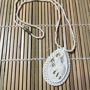 60’s Carved Bone Elephant Pendant Necklace