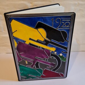 Cyclist's journal. Based on a Tour De France poster from 1920
