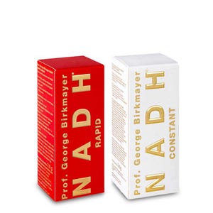 May include: Two rectangular boxes of supplements. One is red with the text "NADH RAPID" in gold. The other is white with "NADH CONSTANT" in gold. Both boxes have the text "Prof. George Birkmayer" in gold.
