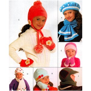 May include: A selection of children's winter hats and mittens. The image shows a red hat with a pom-pom and matching mittens, a blue beret with white trim, a pink hood with mittens, a white polka dot hat, a light blue hat with mittens, and a green hat with a visor.