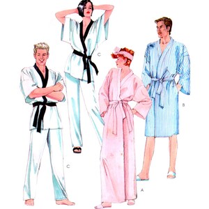 May include: Four different styles of robes, two in white, one in pink, and one in blue and white stripes. The robes have long sleeves and are tied at the waist.