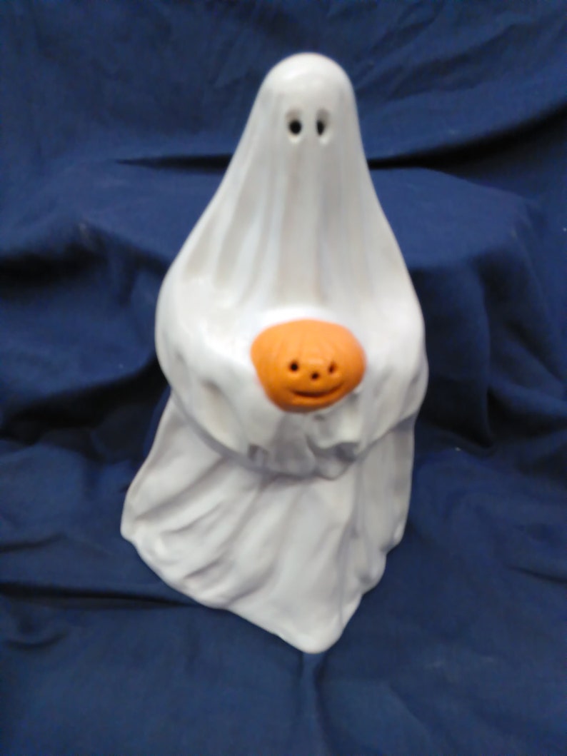 Ghost holding pumpkin | Etsy