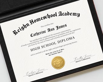 May include: A High School Diploma from Reighn Homeschool Academy, presented in a black folder. The diploma features the name Catherine Ann James, a gold seal, and signatures. The text is in black on a white background.