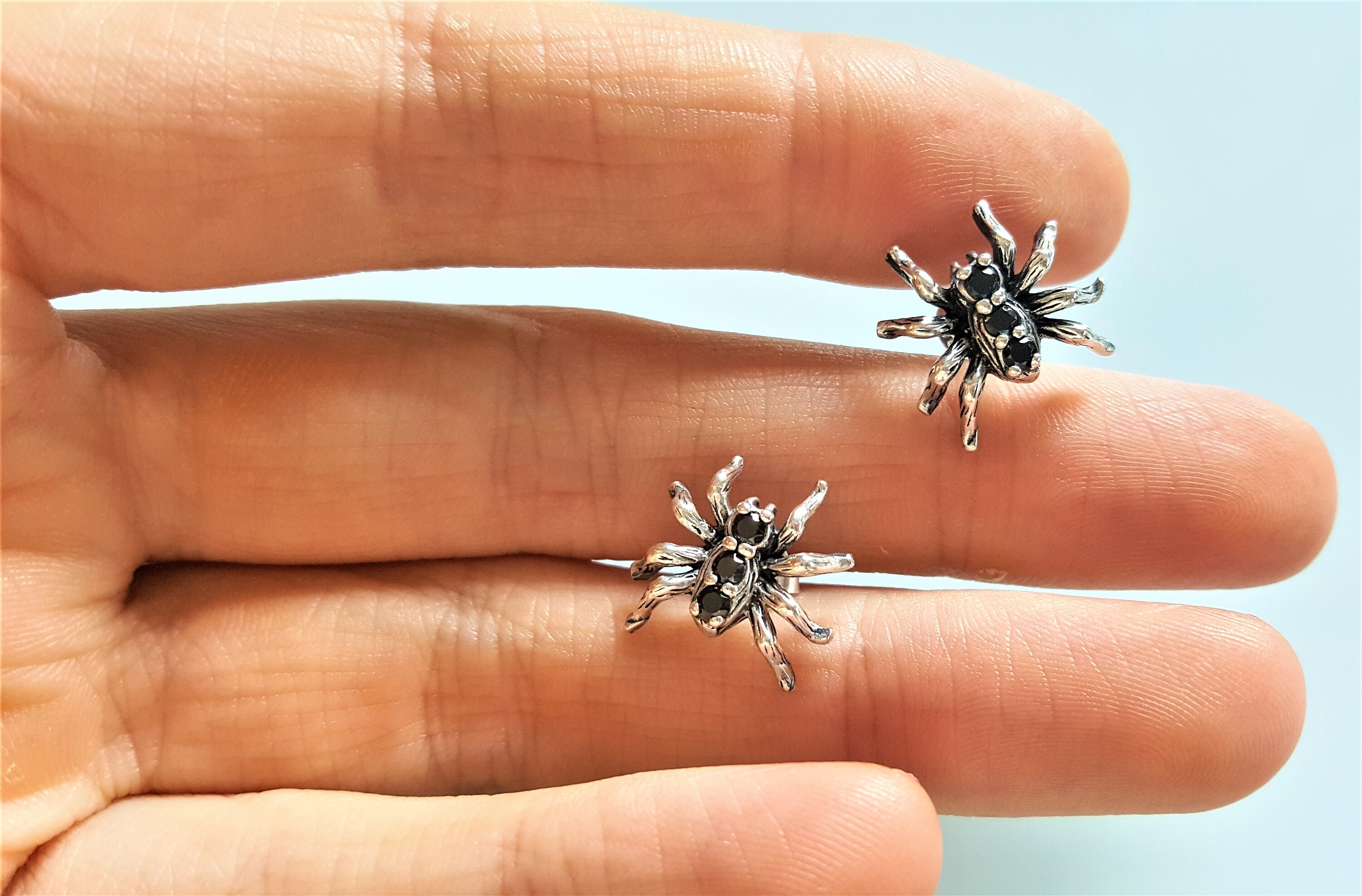 spider stud earrings