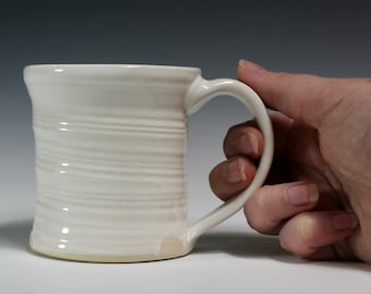 White small ceramic mug, wheel thrown