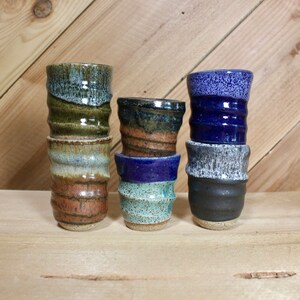 Set of speckled ceramic shot glasses with some available color options