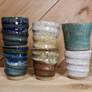 Set of speckled ceramic shot glasses with some available color options