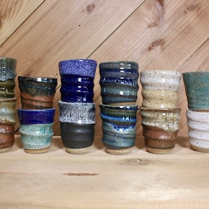 Set of speckled ceramic shot glasses with all available color options