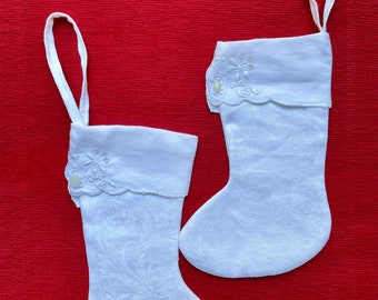 Beautiful vintage linen stockings size small with hanging loops are perfect to hang at your fireplace