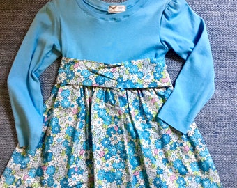 Long sleeve girls dresses with soft cotton knit bodice in sizes 5 and 8