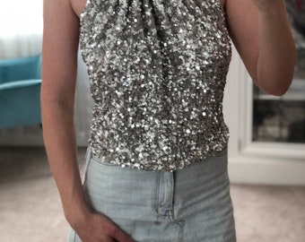 Silver sequins halter top backless Coachella festival outfit  +ViewMyShopFor flared pants gold dress pink wrap skirt hem cowl neck gemstone