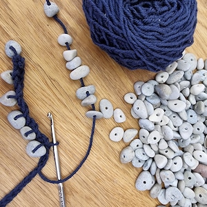 Center drilled pebbles from the Latvian Baltic Sea coast, 100 pebbles with holes, pebbles craft supplies, pre drilled pebbles