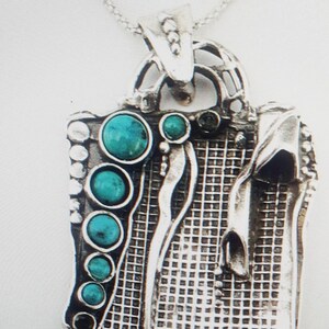 Colgante turquesa de plata de ley hecho a mano, diseño Iarael (H 425DO)