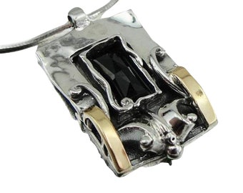 Sterling Silver and Onyx Pendant, Decorated with Yellow Gold