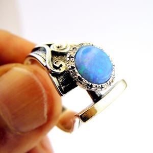 Anillo artístico de ópalo con oro y plata de ley (ms 1439r)