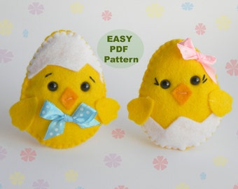 May include: Two felt chick toys, one with a blue bow and the other with a pink bow, both with white felt eggshells. The text "EASY PDF Pattern" is on a green circle in the background.