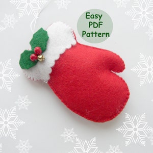 May include: Red felt mitten Christmas ornament with white trim, green holly leaves, and red berries. Easy PDF Pattern.
