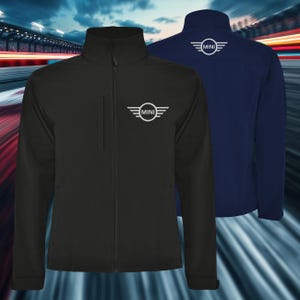 May include: Black and navy blue softshell jackets with the "MINI" logo in white. The jackets have a full-zip closure, a stand-up collar, and a small pocket on the chest. The logo is on the front and back of the jackets.