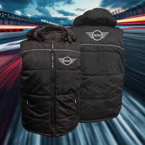 May include: Black hooded puffer vest with a zip. It has a white stripe across the chest and the "MINI" logo on the chest and back. The vest has a quilted design.