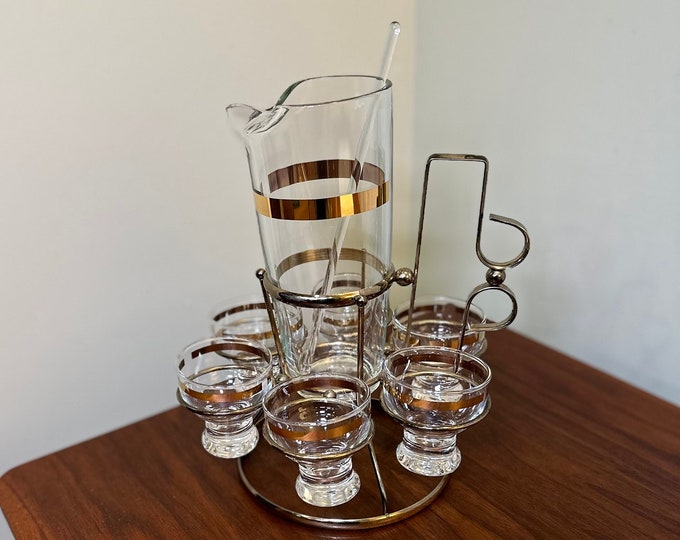 9 piece vintage gold band cocktail set with caddy.
