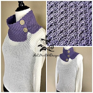May include: A purple crocheted cowl with a scalloped edge and three buttons. The cowl is worn over a white crocheted sweater with a mesh pattern.