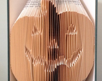 PUMPKIN HALLOWEEN Book Folding Pattern.  DIY gift for folded book art. Very easy step by step instructions. No measuring required