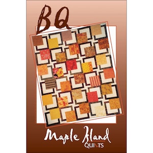 Puede incluir: Un patrón de edredón con el texto "BQ" y "Maple Island Quilts". El diseño del edredón presenta una cuadrícula de cuadrados en varios colores y patrones cálidos, incluyendo estampados florales y de animales.