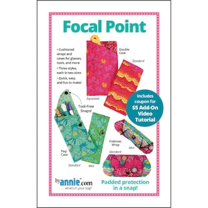 May include: A promotional image for "Focal Point" featuring various fabric cases and wraps for glasses, tools, and more. The image showcases different styles, including a double case, flap case, and foldover wrap, each in standard and mini sizes. The cases have floral patterns and the text "Padded protection in a snap!"