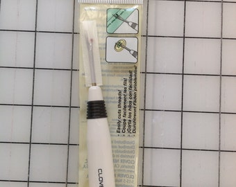 Clover scucitore in plastica bianca - 482CV