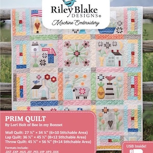 May include: A colorful prim quilt with various embroidered designs, including an American flag, houses, flowers, and a sheep. The quilt is labeled "Prim Quilt" by Lori Holt of Bee in my Bonnet. Wall quilt size is 27.5" x 34".
