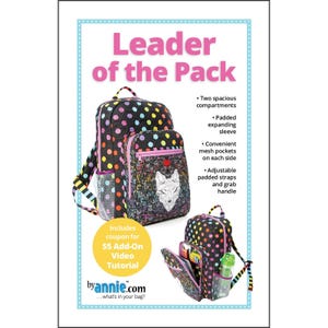 May include: A black backpack with colorful polka dots and a smaller matching backpack with a wolf design. The text "Leader of the Pack" is at the top. Features include two compartments, mesh pockets, and adjustable straps.