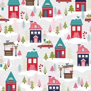 May include: A repeating pattern featuring colorful houses, Christmas trees, and red cars carrying trees on a snowy background. The houses are red, blue, and teal with white accents. The image includes a hot cocoa stand.