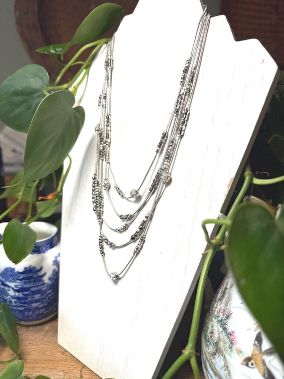 Silver chains with rhinestone studs necklace. - image 1