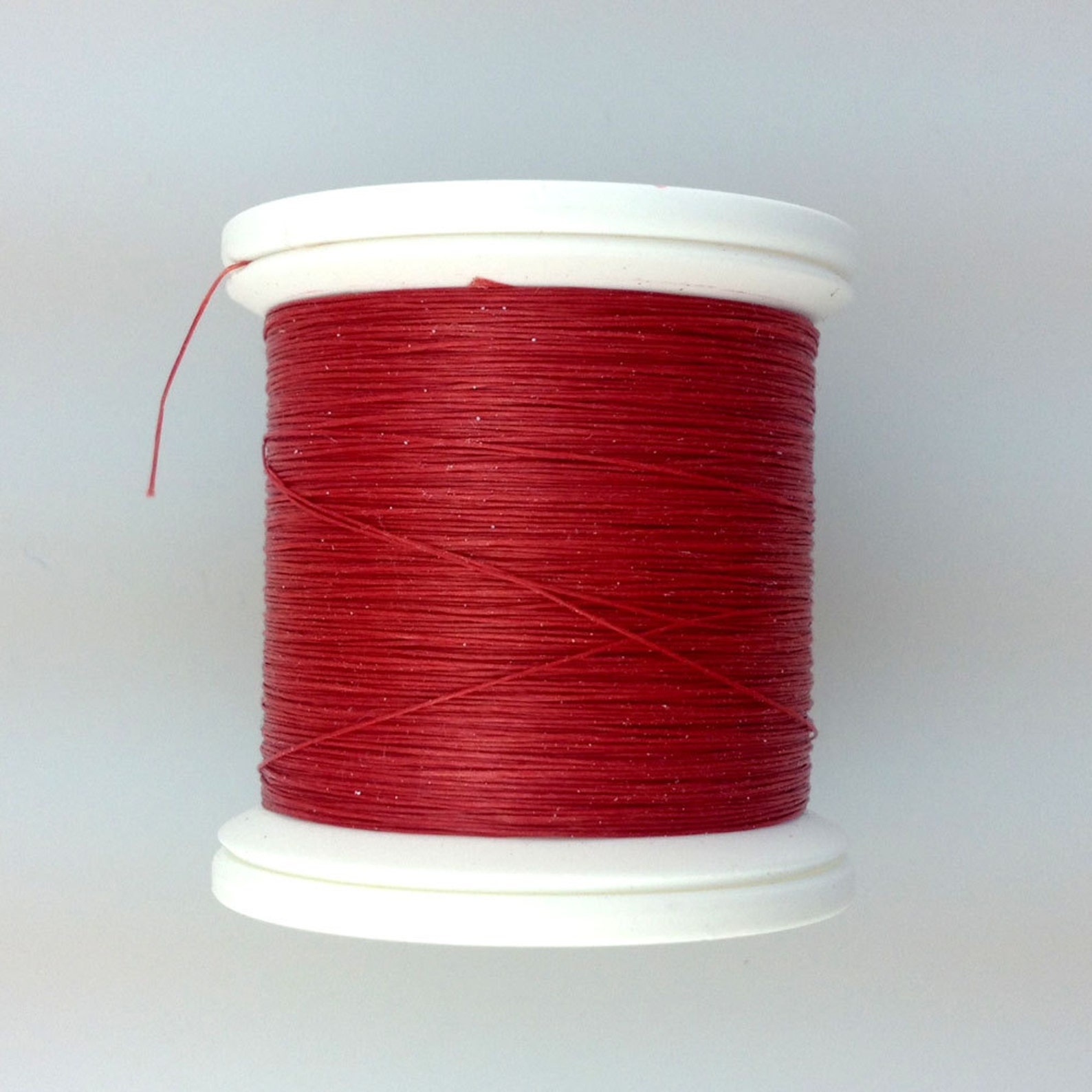 Red Kevlar thread by Gudebrod of Philadelphia USA. Etsy