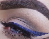 Urban Decay 24 7 Waterproof liquid eyeliner in Retrograde a blackened purple liquid liner authentic new eye liner