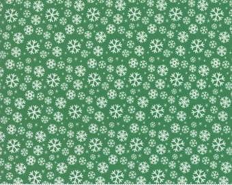 White snowflakes on green background, quilting fabric, from collection Jolly Season by Abi Hall for Moda