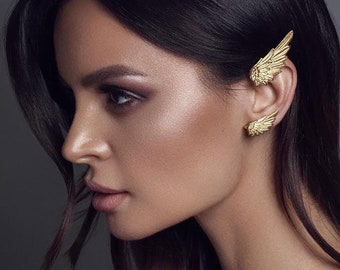 Angel wing earcuff handcrafted in 925 Silver with 3 micron 24 Carat gold plating. Exclusively handcrafted in limited quantities