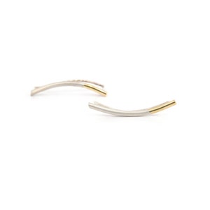 9k gold and sterling silver pair of ear crawler earrings. Ear pin, ear climbers, edgy and modern with simple elegance. Comfortable and light compliment the contour of your ear. A delicate diagonal separates the gold and silver creating a flush line.