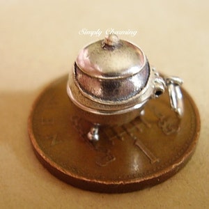 May include: A set of three ceramic mugs with a speckled, matte finish in cream, light grey, and dark grey. Each mug has a simple, minimalist design and a rounded handle.