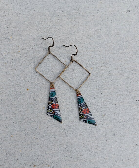 Bronze earrings with resin coated fabrics