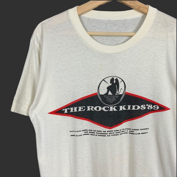 洋書 VINTAGE ROCK T-SHIRTS RARE VINTAGE 80's THE BEATLES 1964 NEWSPAPER ARTICLE ROCK