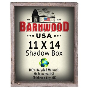 May include: A rustic wooden shadow box frame with a red and white barn image and the text "Barnwood USA 11 x 14 Shadow Box". The frame is made from 100% recycled materials and is made in the USA.