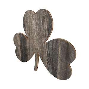 May include: A wooden shamrock with a rustic gray finish. The shamrock is made of three heart-shaped leaves.