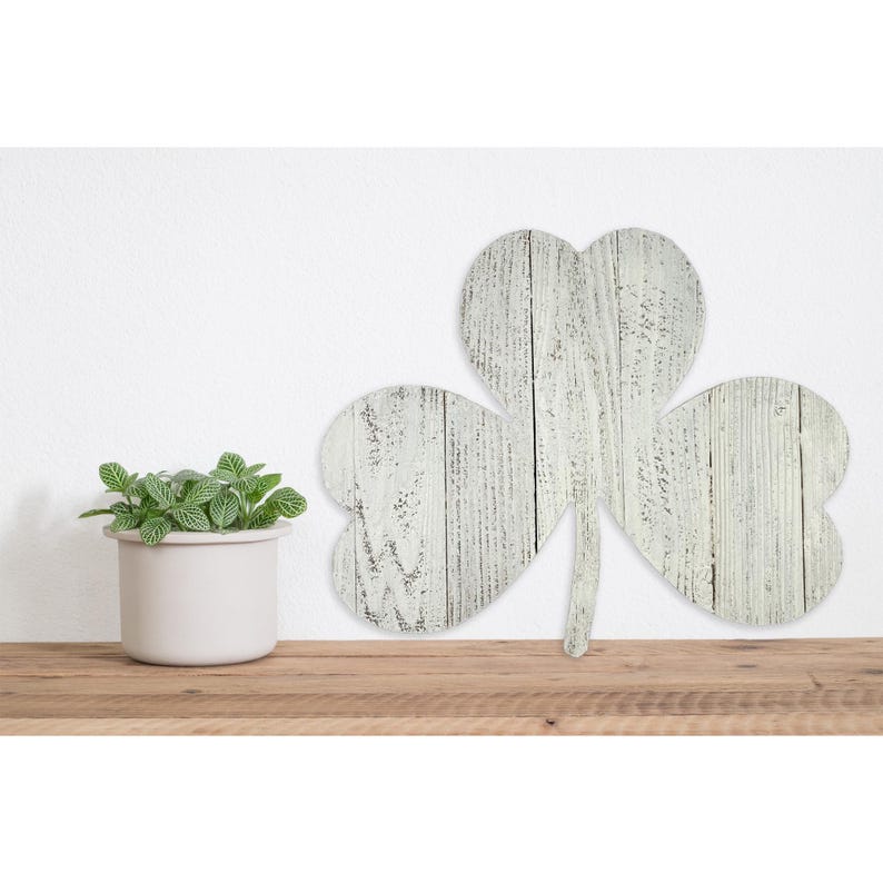 May include: Whitewashed wooden shamrock cutout with a distressed finish. The shamrock is a traditional Irish symbol of good luck.
