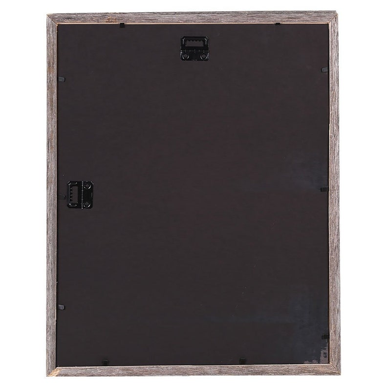 May include: A gray wood picture frame with a black mat and two metal hanging hooks on the back.