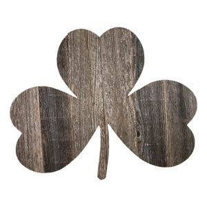 May include: A rustic wooden shamrock cutout with a distressed gray finish. The shamrock is made of reclaimed wood and has a natural, weathered look.