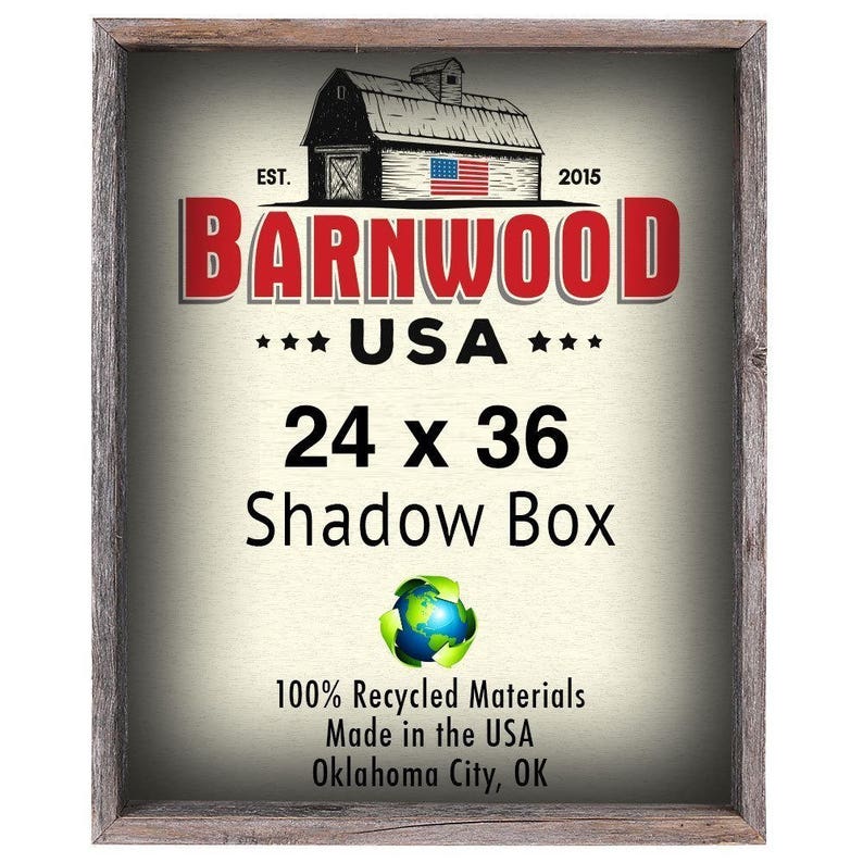 May include: A rustic wooden frame with a white background and the text "BARNWOOD *** USA *** 24 x 36 Shadow Box 100% Recycled Materials Made in the USA Oklahoma City, OK".