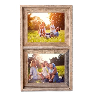 May include: A rustic wooden picture frame with two openings, each displaying a photo of a family enjoying a sunny day outdoors. The top photo shows a family of four sitting in a grassy field, while the bottom photo shows the same family sitting on a blanket in a grassy field.