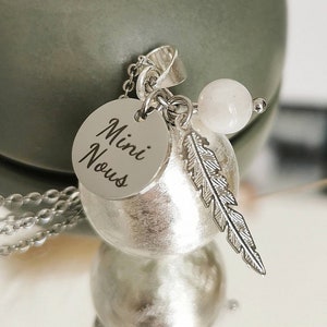 Pregnancy bola Mini Nous feather and its moonstone with multiple virtues for Mom, brushed silver plated ball and steel chain.